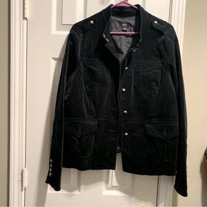 Women’s Black Button Up Jacket. Has a feel like velvet .